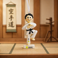 Load image into Gallery viewer, Decorative ornament of a martial artist in a dojo setting
