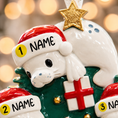 Load image into Gallery viewer, Decorative Christmas ornament with a reindeer wearing a Santa hat and holding a gift, with 'NAME' labels.
