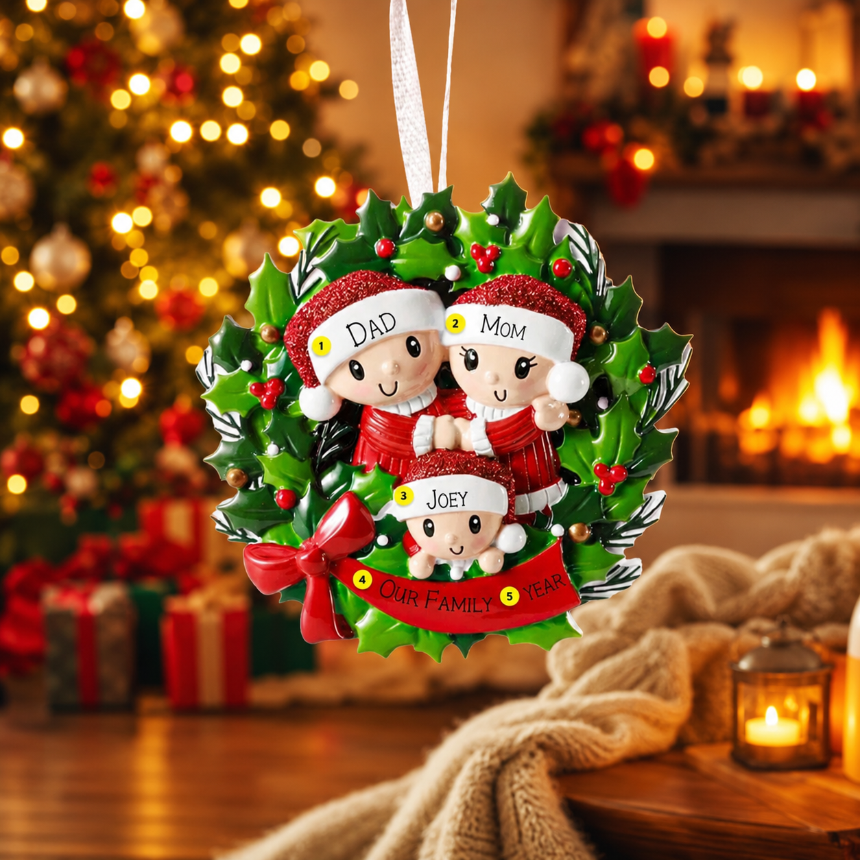 Christmas ornament with family of 3 design on a blurred Christmas tree background
