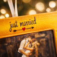Load image into Gallery viewer, Personalized just married photo frame ornament featuring a rustic yellow frame design. A romantic keepsake for newlyweds couples celebrating their first Christmas married or Valentine’s Day. Perfect wedding gift engagement decor and meaningful holiday ornament.
