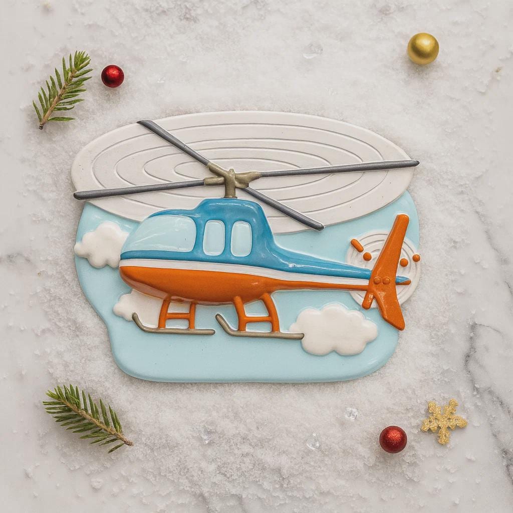 Cookie shaped like a helicopter on a marble surface with decorative elements.