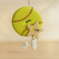 Load image into Gallery viewer, Decorative ornament shaped like a softball with customizable name and year details on a beige background
