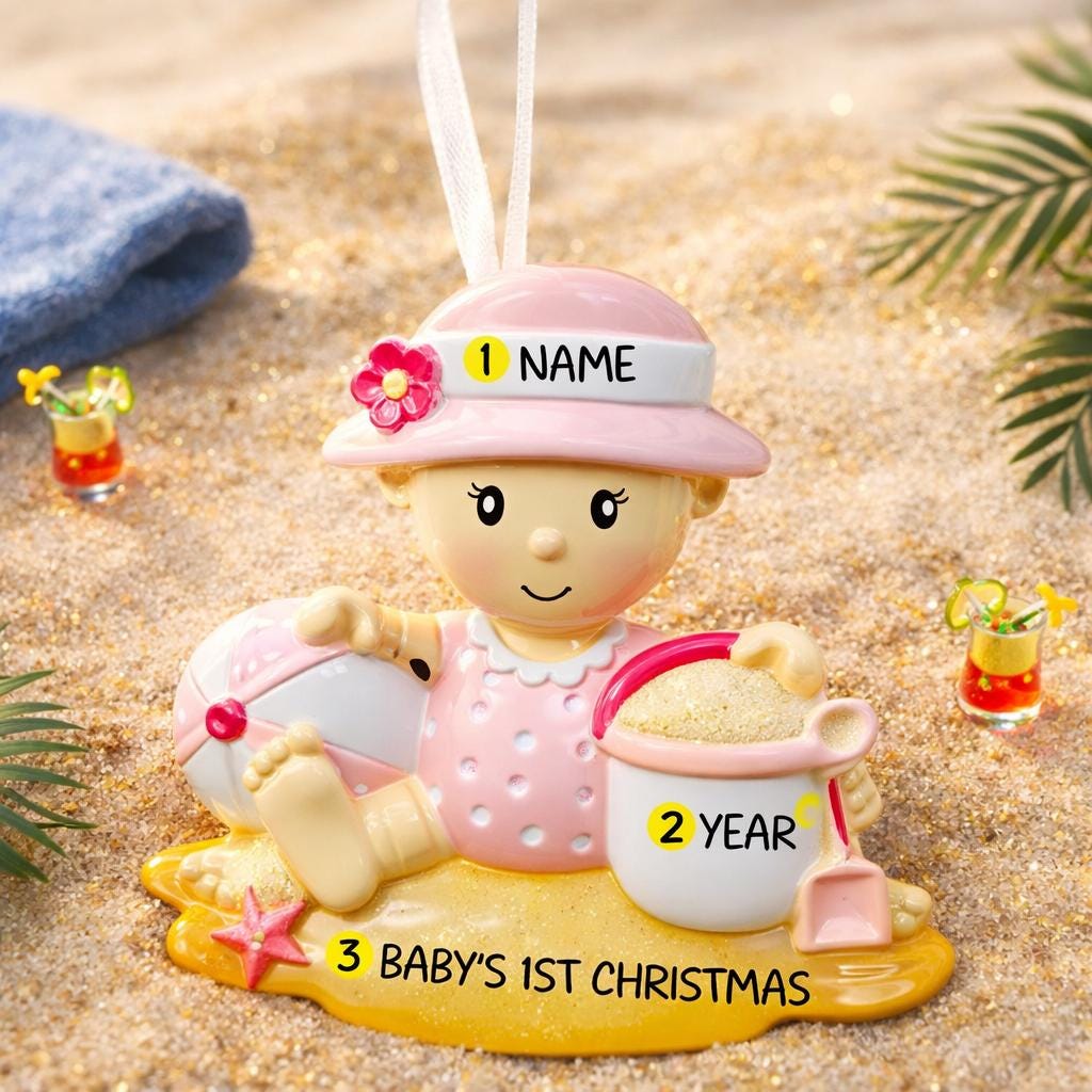 Personalized baby first Christmas ornament for baby girl featuring a beach and summer inspired design. This adorable keepsake includes handwritten name and year personalization, a soft pink baby figure, sand details and playful seaside elements. The ornament has a lightweight 2D base with raised 3D detailing on the front only. Perfect for baby’s first Christmas, nursery decor, coastal holiday themes and meaningful family gifts.