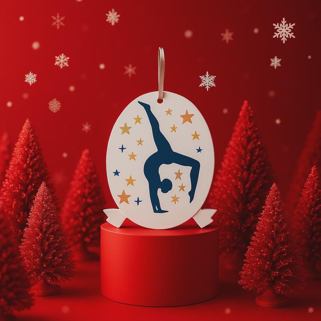 Personalized gymnastics Christmas ornament featuring an oval white design with a navy blue gymnast silhouette performing a handstand pose, surrounded by gold and blue star accents, customizable year displayed on the upper area, customizable name space on the bottom banner, smooth glossy finish with raised 3D front details and flat 2D back, white hanging ribbon, photographed on a soft pink snowy holiday background with winter greenery, festive ornaments, and warm seasonal styling.
