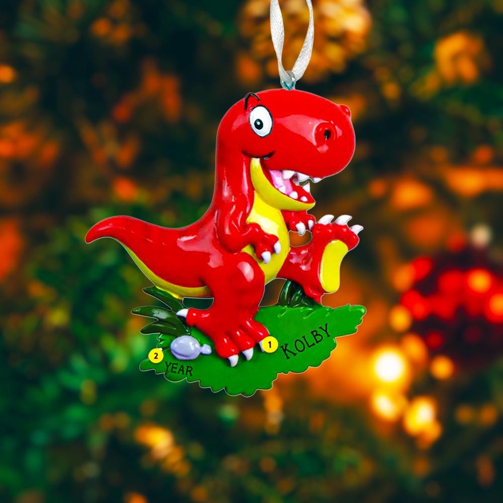 Colorful dinosaur themed Christmas ornament designed for kids, featuring a playful character and bright cheerful tones. Set in a cozy holiday scene, this ornament brings fun and imagination to children’s Christmas tree decor. Designed to be personalized, making it a special keepsake for kids who love dinosaurs and playful holiday decorations.
