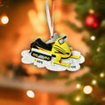 Load image into Gallery viewer, Christmas ornament with skates on a blurred Christmas tree background

