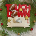 Load image into Gallery viewer, Decorative sign with 'Touch Down' text, footballs, and a helmet on a green background with Christmas decorations.
