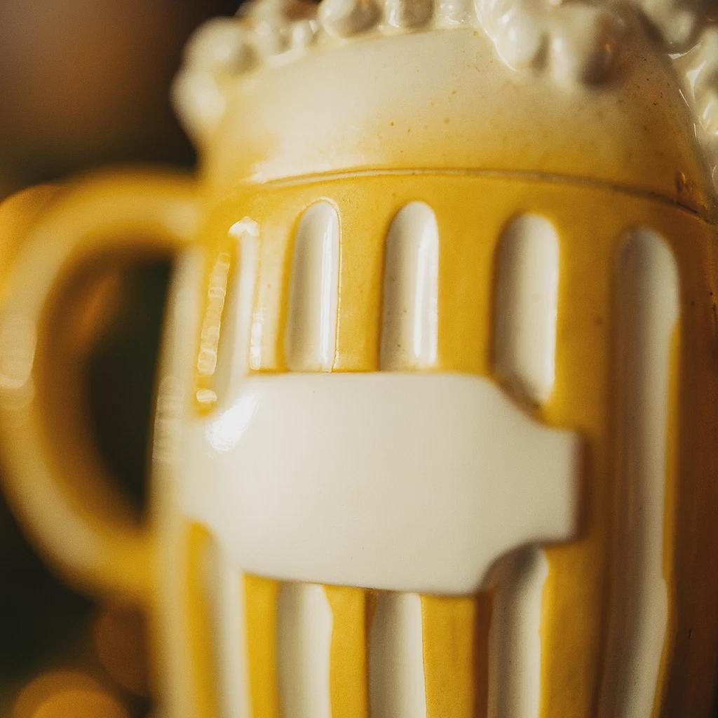Close-up of a ceramic mug with a handle and textured surface