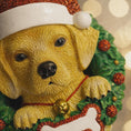 Load image into Gallery viewer, Dog figurine wearing a Santa hat with a Christmas wreath background
