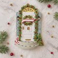 Load image into Gallery viewer, Decorative Christmas door with wreath, candy canes, and ornaments on a marble surface.
