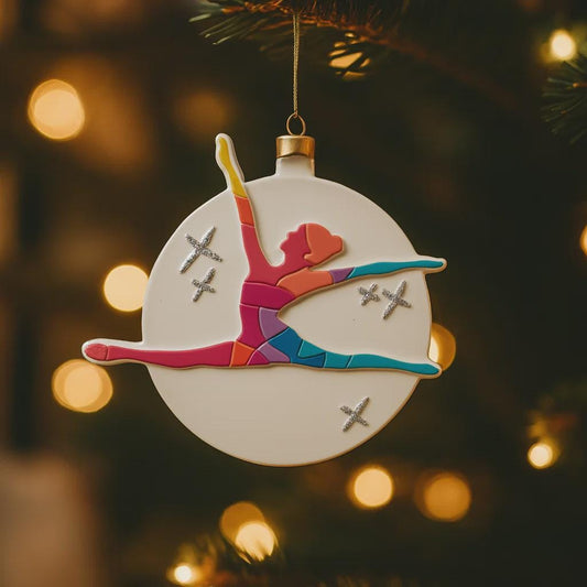 Colorful gymnast ornament on a Christmas tree with blurred lights in the background