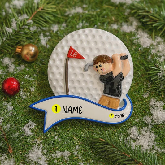 Golf-themed ornament with a golfer on a golf ball, surrounded by Christmas decorations.