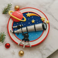 Load image into Gallery viewer, Decorative plate with space-themed design including a telescope, planets, and stars on a marble surface.
