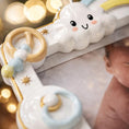 Load image into Gallery viewer, Cute cloud-shaped toy with a baby's hand holding it, blurred lights in the background
