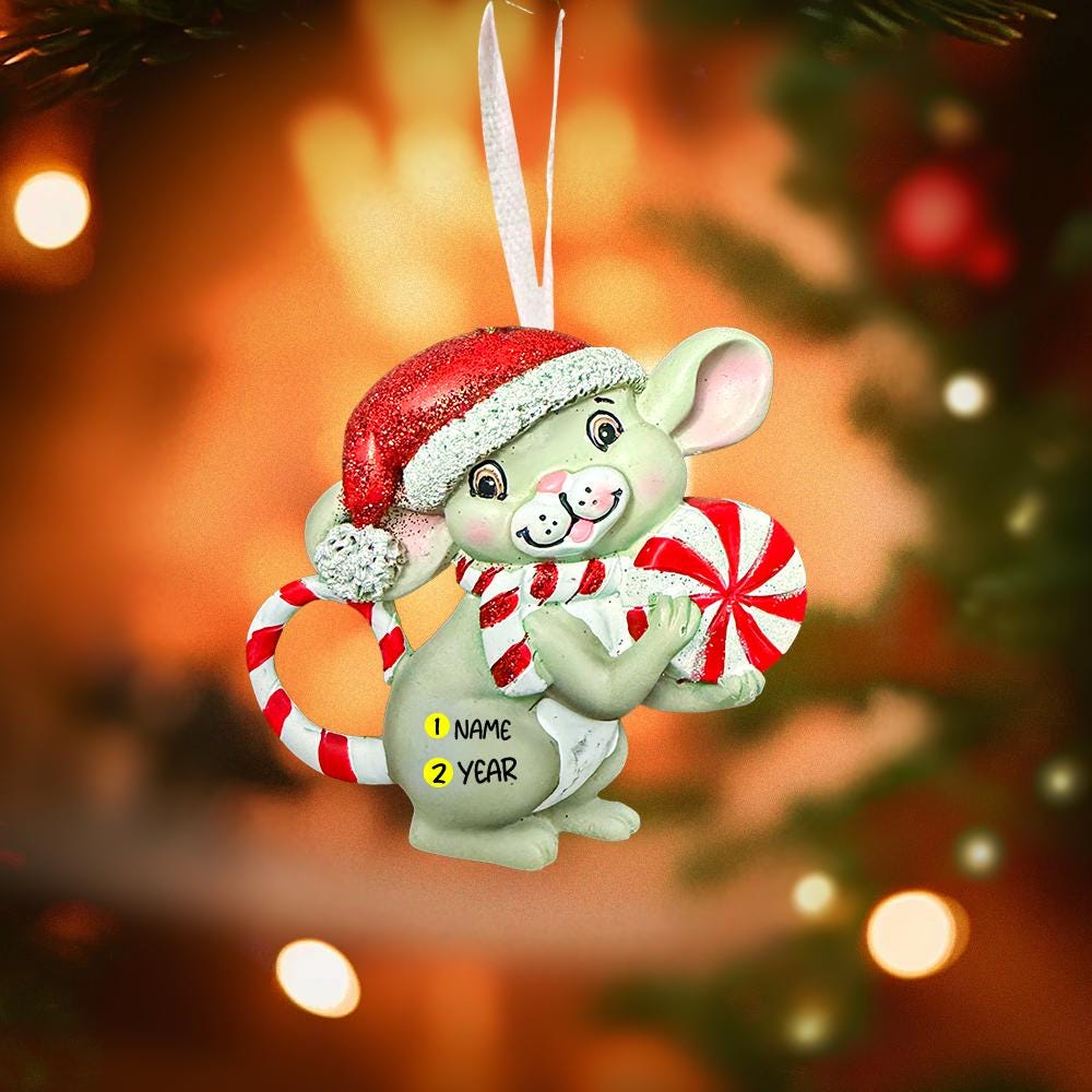 Christmas ornament of a mouse with candy canes against a festive background