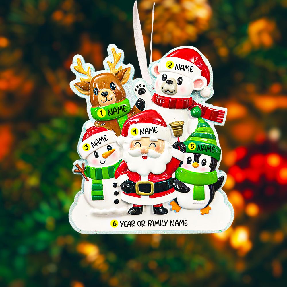 Personalized Christmas ornament with Santa Claus, reindeer, polar bear, snowman, and penguin against a blurred Christmas tree background.