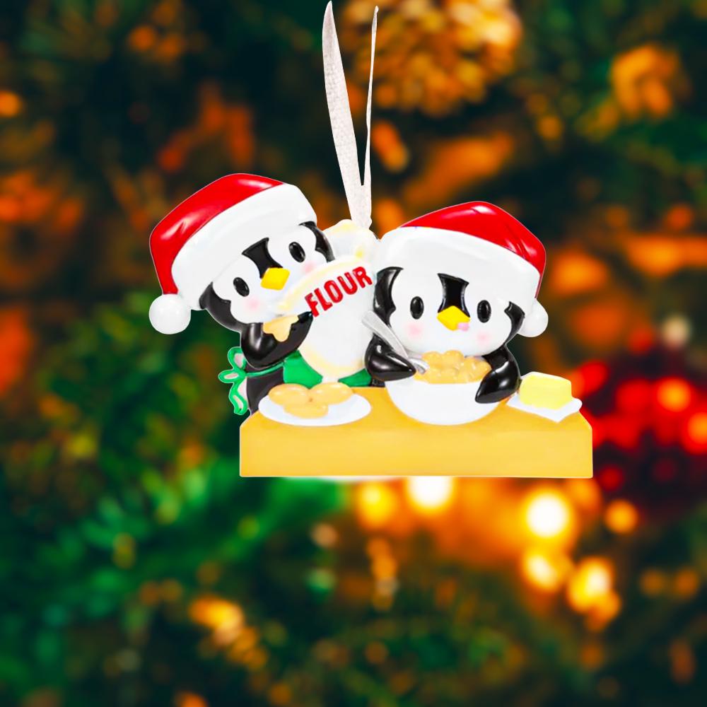 Cute penguin couple ornament featuring two festive penguins baking together, dressed in Santa hats and sharing a cozy holiday moment. This playful Christmas ornament is perfect for couples, partners, siblings, or loved ones who enjoy cooking, baking, or spending time together during the holidays. A charming keepsake that adds warmth, fun, and personality to any Christmas tree or seasonal decor.
