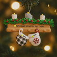 Load image into Gallery viewer, Christmas ornament with candles, holly, mittens, and customizable text on a decorated tree.
