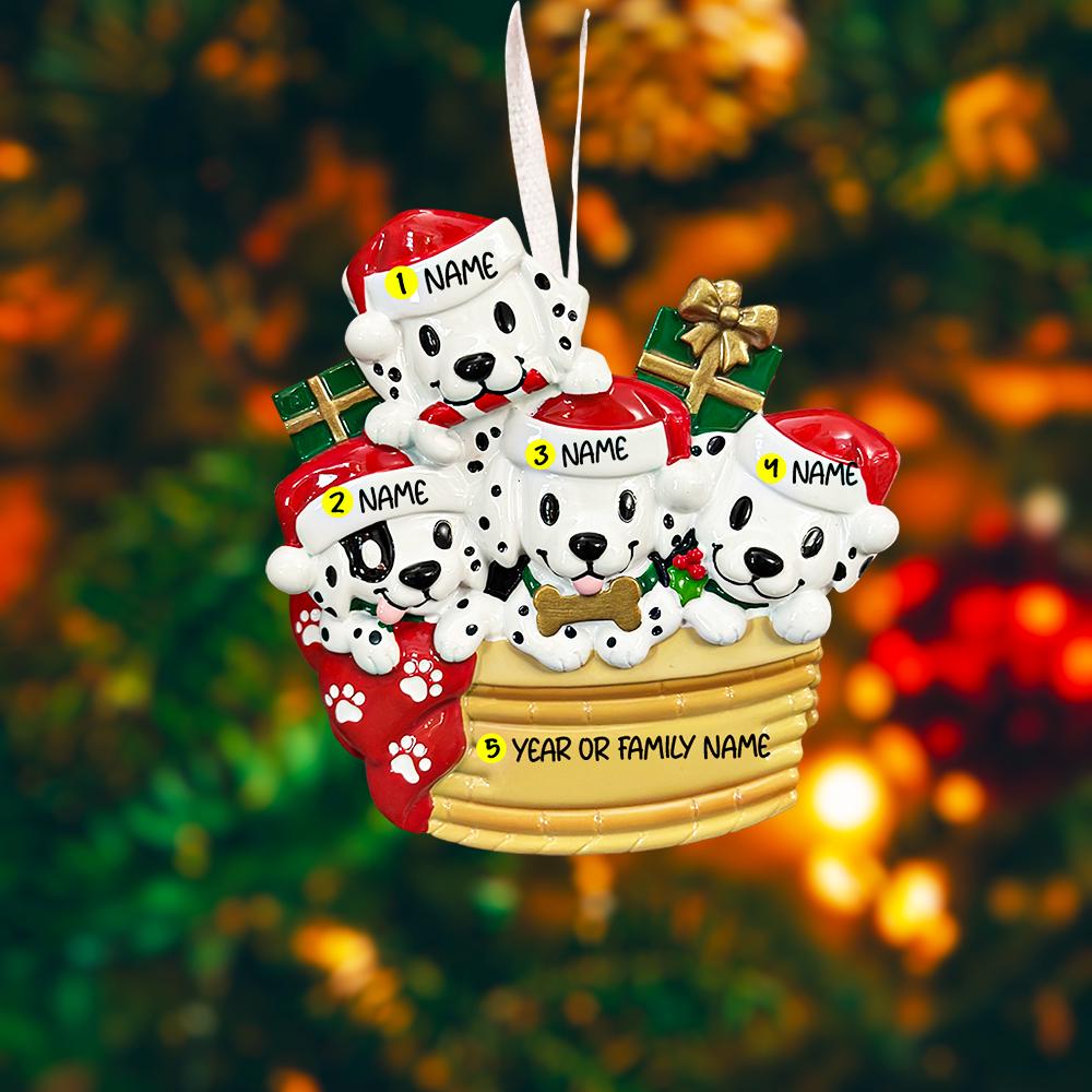 Personalized Christmas ornament with five Dalmatians in a basket, each labeled with a name, against a festive background.