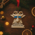 Load image into Gallery viewer, Decorative ornament of a goat wearing sunglasses with 'G.O.
