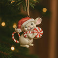 Load image into Gallery viewer, Christmas ornament of a mouse with a Santa hat and candy canes on a decorated tree.
