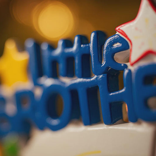 Blue and red text on a star-shaped object with a blurred background