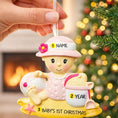 Load image into Gallery viewer, Personalized baby first Christmas ornament for baby girl featuring a beach and summer inspired design. This adorable keepsake includes handwritten name and year personalization, a soft pink baby figure, sand details and playful seaside elements. The ornament has a lightweight 2D base with raised 3D detailing on the front only. Perfect for baby’s first Christmas, nursery decor, coastal holiday themes and meaningful family gifts.
