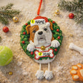 Load image into Gallery viewer, Bulldog Christmas ornament with customizable name and age on a sandy background with toys.
