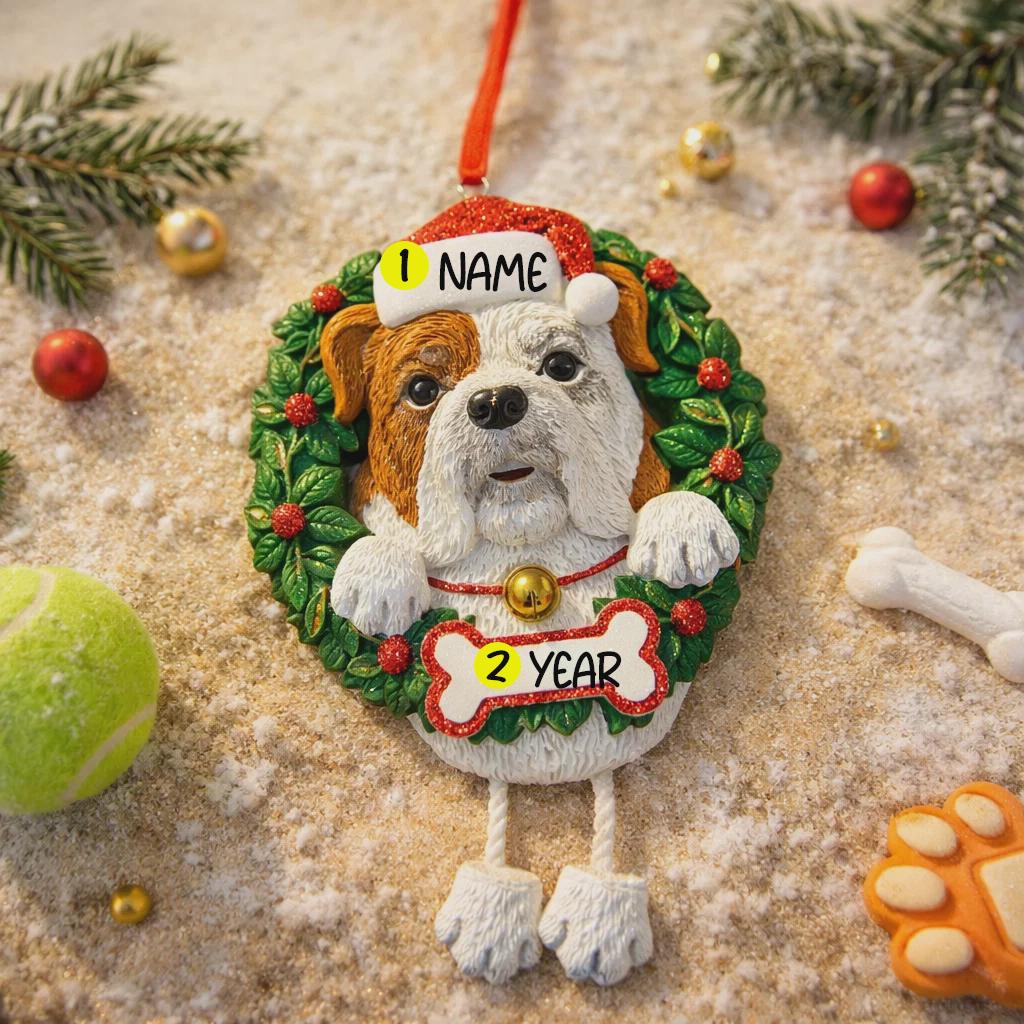 Bulldog Christmas ornament with customizable name and age on a sandy background with toys.