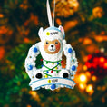 Load image into Gallery viewer, Personalized baby boy llama ornament featuring a cute smiling llama wearing a winter hat and surrounded by a festive wreath with colorful holiday lights. Soft blue and white tones create a cozy winter look. Handwritten personalization includes baby name and Baby’s First Christmas with year. Mostly 2D ornament with raised 3D details on the front only, lightweight and perfect for Christmas trees, nursery decor, and baby keepsakes.
