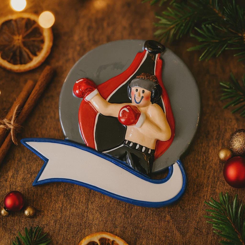 Decorative Christmas ornament of a boxer on a wooden surface with festive decorations.