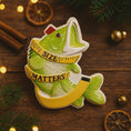 Load image into Gallery viewer, Decorative fish ornament with 'SIZE MATTERS' text on a wooden background with Christmas decorations.
