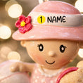 Load image into Gallery viewer, Personalized baby first Christmas ornament for baby girl featuring a beach and summer inspired design. This adorable keepsake includes handwritten name and year personalization, a soft pink baby figure, sand details and playful seaside elements. The ornament has a lightweight 2D base with raised 3D detailing on the front only. Perfect for baby’s first Christmas, nursery decor, coastal holiday themes and meaningful family gifts.
