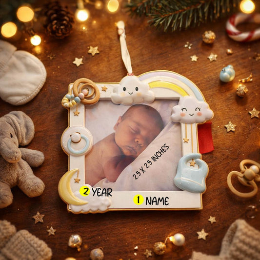 Decorative photo frame with a baby's picture on a wooden surface with Christmas decorations.