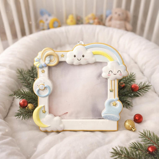 Decorative photo frame with cloud and rainbow design on a soft surface with Christmas decorations.