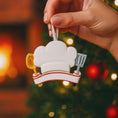 Load image into Gallery viewer, Personalized chef Christmas ornament featuring a white chef hat design with a wooden spoon and metal spatula details. Customized with a name and year on the front banner. Glossy resin finish with clean white and red accents creates a fun and professional cooking themed holiday look. Mostly 2D ornament with raised 3D details on the front only, lightweight and perfect for Christmas tree decor or kitchen themed gifts.
