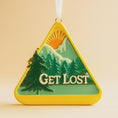Load image into Gallery viewer, Triangular ornament with mountain and trees design and 'GET LOST' text on a beige background
