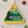 Load image into Gallery viewer, Decorative ornament with mountain and tree design and 'GET LOST' text on a light background.

