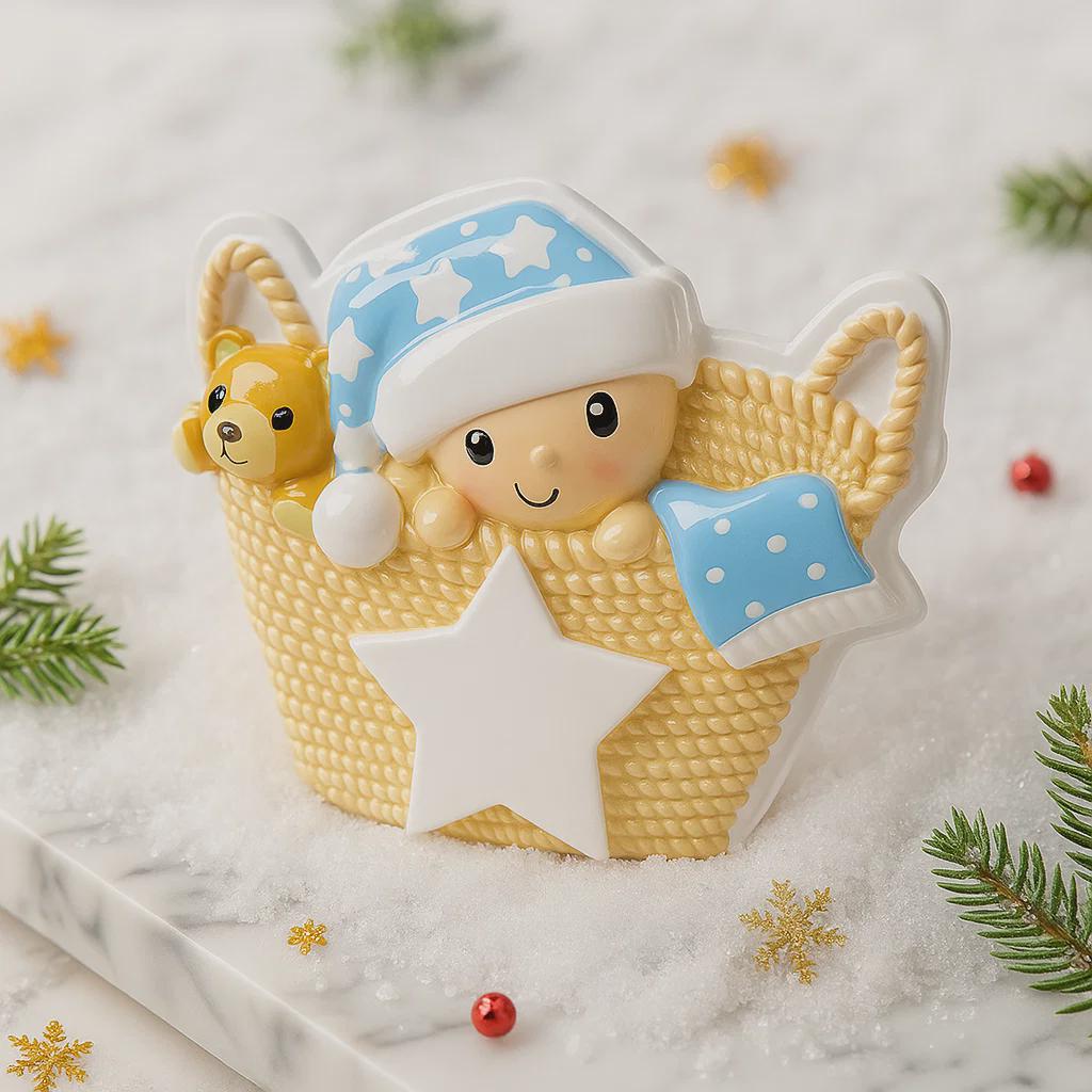Personalized Baby First Christmas Ornament featuring a sweet newborn tucked inside a cozy woven basket with a soft blue star hat and matching blanket. This 3D front design includes raised details, textured knit pattern, and adorable teddy bear accent, creating depth and charm. Name is displayed on the hat and year on the star. A heartfelt keepsake for baby’s first holiday, nursery decor, or newborn gift. Perfect Christmas tree ornament for new parents.