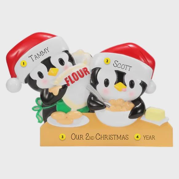 Cute penguin couple ornament featuring two festive penguins baking together, dressed in Santa hats and sharing a cozy holiday moment. This playful Christmas ornament is perfect for couples, partners, siblings, or loved ones who enjoy cooking, baking, or spending time together during the holidays. A charming keepsake that adds warmth, fun, and personality to any Christmas tree or seasonal decor.

