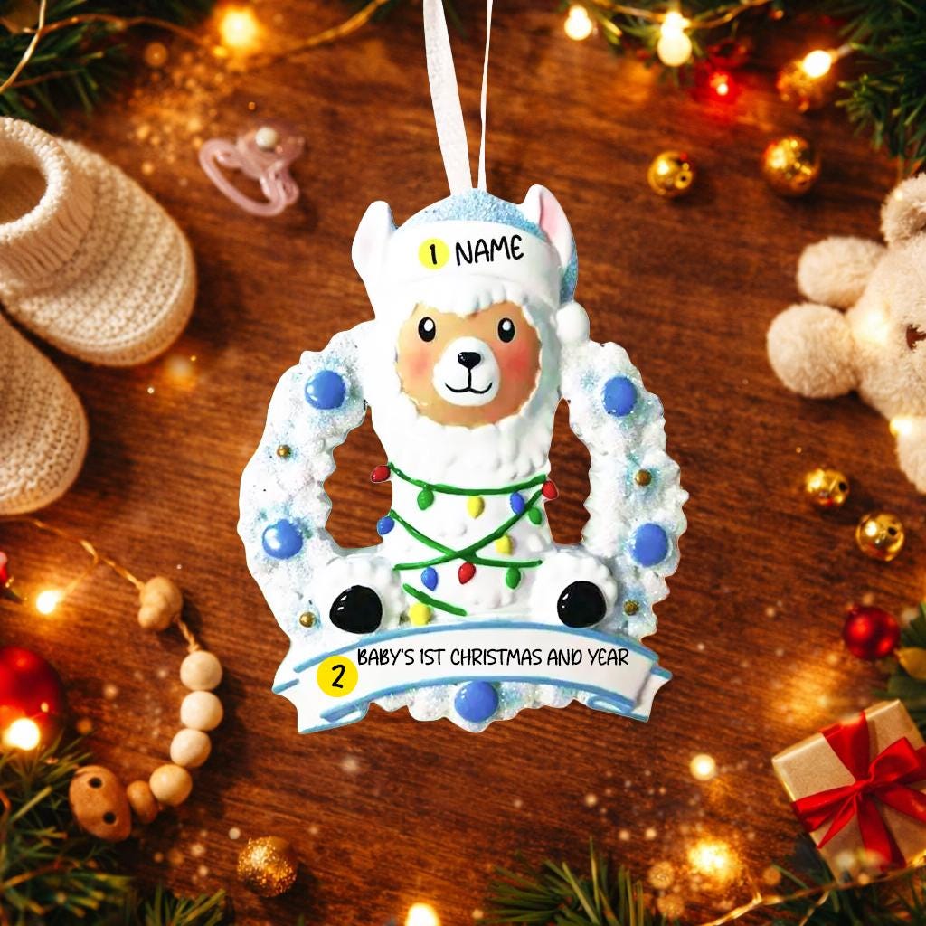 Personalized baby boy llama ornament featuring a cute smiling llama wearing a winter hat and surrounded by a festive wreath with colorful holiday lights. Soft blue and white tones create a cozy winter look. Handwritten personalization includes baby name and Baby’s First Christmas with year. Mostly 2D ornament with raised 3D details on the front only, lightweight and perfect for Christmas trees, nursery decor, and baby keepsakes.