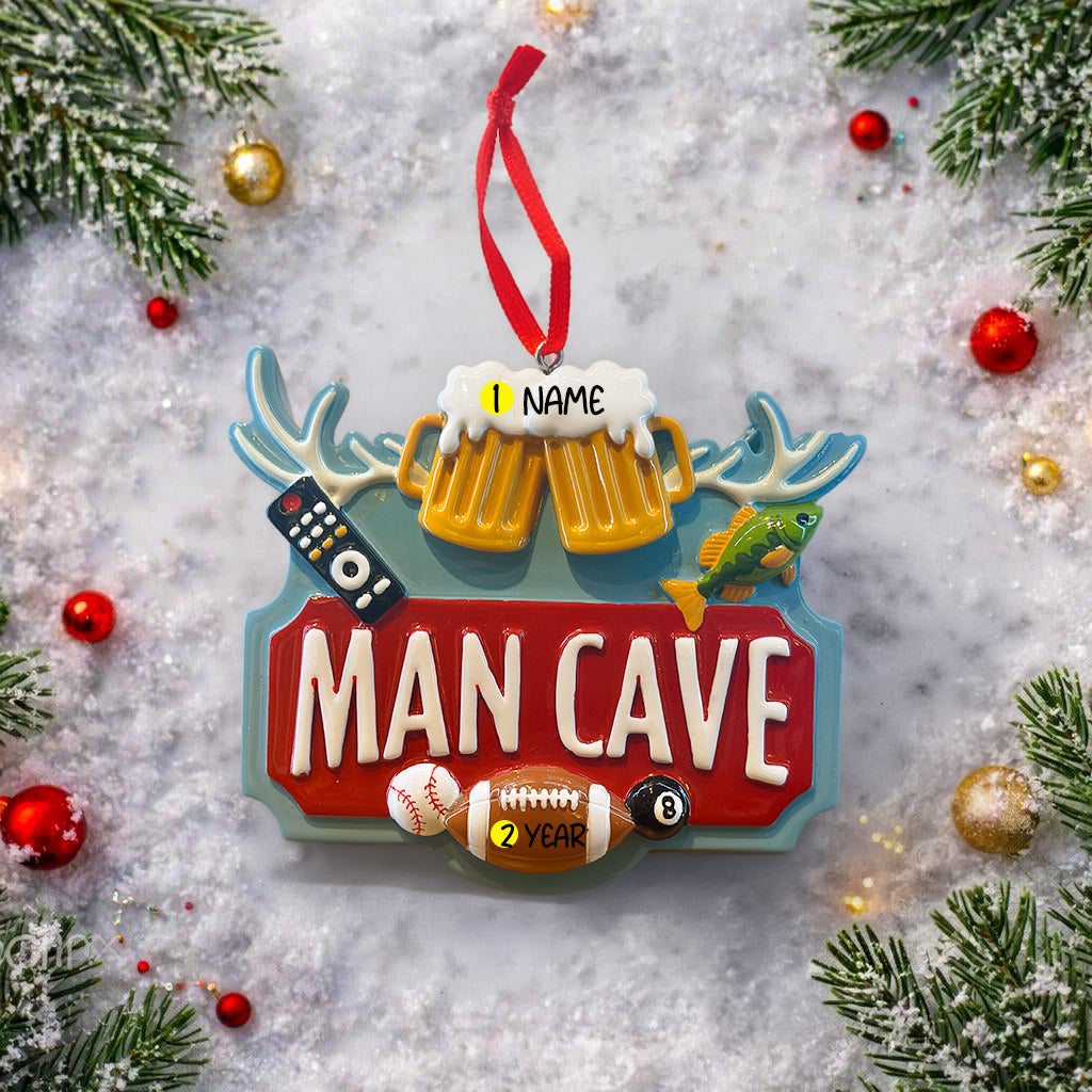 Man cave themed personalized ornament featuring a bold red Man Cave sign design with raised 3D details including beer mugs antlers sports icons and hobby elements. The ornament allows name personalization on the top area and year personalization at the bottom making it a fun and meaningful keepsake. Designed with a flat back for easy hanging this ornament is perfect for man cave decor Christmas trees or gift displays. Ideal for dads husbands boyfriends and anyone who loves their personal space traditions an