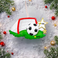 Load image into Gallery viewer, Personalized soccer ornament featuring a detailed goal and ball design with a glossy finish and raised 3D details. The ornament includes one custom name and year displayed on the front. Styled with festive lighting and greenery, this sports themed ornament is perfect for soccer lovers, players, and coaches. Designed with a 3D front and flat back, lightweight and easy to hang on a Christmas tree or display year round.

