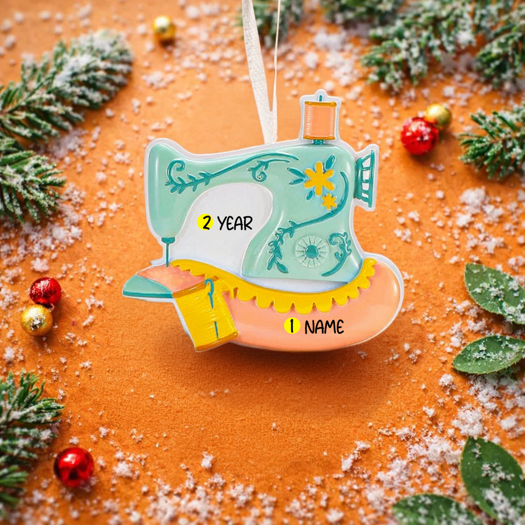 Personalized sewing machine ornament featuring a charming vintage style design with soft pastel colors and floral details. The ornament includes space for a name and year, making it a meaningful keepsake gift. Crafted from durable resin with a detailed 3D raised front and flat 2D back for smooth hanging. Includes free handwritten personalization. A perfect Christmas ornament gift for grandmothers sewing lovers quilters crafters and anyone who enjoys handmade traditions and creative hobbies.