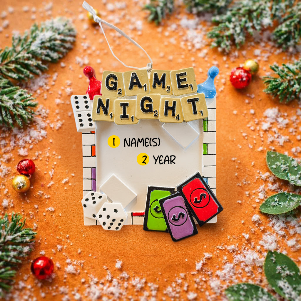 Personalized game night ornament featuring a playful board game inspired design with dice tiles and colorful game pieces. Includes free handwritten personalization with name or names and year displayed on the front. Designed with a raised 3D front and flat back for easy hanging. Perfect for board game lovers family game nights and Christmas tree decor. A fun keepsake gift for friends couples and families who love game nights.