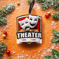 Load image into Gallery viewer, Personalized theater ornament featuring classic comedy and tragedy drama masks on a stage design. Custom name and year handwritten on the front banner. High detail 3D resin ornament with black hanging ribbon. Ideal Christmas tree decoration for theater lovers actors actresses drama students and stage performers. A meaningful keepsake celebrating passion for theater and performing arts.

